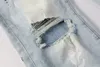 Jeans viola di marca viola Jeans da uomo High Street Pantaloni in denim blu con foro rotto Pantaloni lavati slim fit effetto consumato