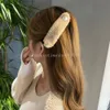 女性のためのソフトフェイクファーヘアクリップバレット