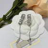 Boucles d'oreilles pendantes de créateur pour femmes, boucles d'oreilles de styliste, boucles d'oreilles en diamant, lustre en perles, cœur plaqué argent, accessoires de lettres MLU, bijoux, boucles d'oreilles orecchini