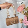 Złoty błyszczący niedoskonały diament Bowknot Embedding Mała kwadratowa torba obiadowa Pearl Mobile Telefon Bag ręczna torba na crossbody Bag Girl 230401