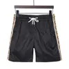 Summer Mens Shorts Designers Casual Sports 2023 Mode Séchage rapide Hommes Pantalons de plage Lettre noire et blanche Imprimer Court Taille asiatique M-XXXL