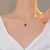 Collier trèfle de styliste en acier et titane pour femmes, pendentif double face, nouvelle mode, chaîne de pull pour sens senior