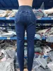 Jeans da donna in vita skinny per donna occhiello con occhiello allacciatura tasca design tinta unita