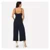 Kvinnors jumpsuits rompers fast färg v-ringning rygglös romper breda ben byxor siamese split spaghetti casual