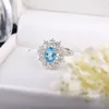 Cluster-Ringe ITSMOS Natürlicher Topas-Edelstein Echtes versilbertes Pflaster CZ-Bänder London Blue Diamond Zierlicher Schmuck für Frauen Geschenk