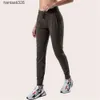 LL femmes Yoga neuvième pantalon pousser Fitness Leggings doux taille haute hanche ascenseur élastique décontracté Jogging 7 couleurs 2023