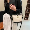 Bolsas de Ombro Bonito balde em forma de cruz saco feminino macio Líder Soulder saco 2023 tendência barra e bolsa luxuosa bolsa feminina elegantedesignerbags