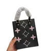 23FW Women Luxurys Designer Mini Totes väskor läder axel rem handväska tryck blommor shouder crossbody dame handväskor messenger väska påse