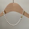 Collier de perles naturelles pour femmes, filles élégantes, lumière circulaire brillante, pendentifs en perles, mode Vintage, chaînes à pampilles