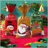 Décorations de Noël Décorations de Noël 25/50 / 100pcs Père Noël Bonhomme de neige Sacs de bonbons mélangés Sac cadeau en plastique Joyeux 2023 Décoration d'intérieur N Dhjzi