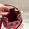 Fashion Designer bag New counter custom fabric hardware logo lining size 17X18cm mini bucket bag Hand-held crossbody bag