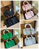 Toppkvalitet Keepall Duffel Väskor Kudde påse Kvinnor Real Leather Axel Bag Handväskor Damer Tote Luxurys Designers Womens Bags