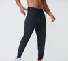 Lavorazione all'ingrosso di pantaloni sportivi e per il tempo libero da uomo personalizzati, leggings fitness traspiranti e ad asciugatura rapida, pantaloni da corsa per esterni