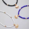 Bracelets de cheville bohémien en coquillage, ensemble de bracelets de cheville pour femmes et filles, simples, perles noires, bleues et blanches, chaînes de pied multicouches, bijoux de plage de mer, 24718