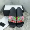 donna Uomo Pantofole sandali Spiaggia Designer di lusso Estate Moda graffiti Infradito Scarpe da donna in pelle Pantofola sneakers Ciabatte con doppia fibbia