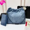 Kanal 22 denim Grand Shopping Bag Tote Travel Designer Kvinna Sling Body dyraste handväska med Sier -kedjan Gabrielle quiltad 552G