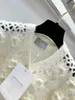 Cardigan blanc en tricot pour femme, pull ajouré, à la mode, doux, motif Floral, haut tricoté, collection automne 2023