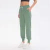 LL-01 Pantalon d'entraînement Pantalon pour femme Tenue de yoga Pantalon ample Neuvième pantalon Excerise Sport Gym Course Casual Pantalon long à bandes à la cheville Élastique Taille haute Cordon de serrage