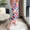 Jupes rétro léger luxe Miyake jupe plissée à pois pour les femmes été taille haute minceur une étape imprimée mince hanche