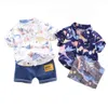 Baby casual kläder set tecknad dinosaurie skjorta med shorts kostymer pojke korta ärmkläder kläder barn resor slitage