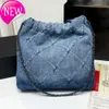 Kanal 22 denim Grand Shopping Bag Tote Travel Designer Kvinna Sling Body dyraste handväska med Sier -kedjan Gabrielle quiltad 552G