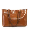 Bolsas de noche Moda 2023 Leche de cuero de lujo Vaca de mujer Bolsa transparente grande Bolso de hombro portátil Bolsos de caramelo Bolsos de fresa