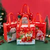 Envoltório de presente StoBag 12pcs Ano de Natal Sacolas Embalagem de presente Não-tecido Alça de Papai Noel Suprimentos Feitos à Mão Crianças Favores de Festa 231102