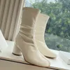 Botas para mujer de diseñador famoso Botas elásticas de lujo para mujer Botas occidentales con punta dividida Botas Chelsea Martin Botas para mujer de Australia Zapatos negros con punta redonda Tamaño 35-40
