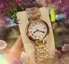 Famoso clásico pequeño reloj de estilo de diseño con esfera de luna Todo el reloj de acero inoxidable Movimiento de cuarzo para mujer Caja de plata para mujer Reloj de pulsera Montre De Luxe Regalos