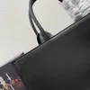 고급 토트 가방 고품질 디자이너 쇼핑백 패션 카우 히드 대용량 남자와 여자 컴퓨터 가방 여행 가방 도매