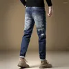 Mäns jeans vår och höst bekväma tungvikt trendiga märke repade hål raka denim byxor xintang män