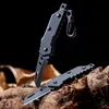 Coltello pieghevole piccolo Coltello da campeggio portatile Coltello tascabile seghettato in acciaio inossidabile multifunzione Strumento EDC MINI Taglierina Lame nere Coltelli da frutta