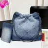 Kanal 22 denim Grand Shopping Bag Tote Travel Designer Kvinna Sling Body dyraste handväska med Sier -kedjan Gabrielle quiltad 552G