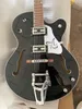 Top zwarte Double F Hollowbody Jazz elektrische gitaar, grote Tremolo-systeemgitaar