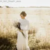 Sukienki macierzyńskie białe koronkowe plisowane sukienka macierzyńska kobieta kwiaty zszywające koronkowe fotografię z długimi rękawem do ciężarnej obfitej długiej sukienki Q231102