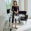 YIGELILA Spring Fashion Women Black Dress Slash-neck Long Sleeves Elegant A-line Dress Dinner Party Dress Mid-calf 65241