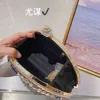 Celebrity Shiny Lingshui Clip Box Shell Bag Banket Metal Small Square Bag Handheld Crossbody Bag 231102