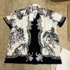 Nieuwe luxe ontwerper Shirts Mens Mens Fashion Geometric Print Bowling Shirt Hawaii Floral Casual Shirts Men Slim Fit Short Sleeve Shirtsss