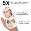 Compact Mirrors Mini miroir de maquillage à LED compact avec lumière grossissante 5X petite poche portable voyage rose noir miroirs de vanité cosmétiques pliables 231102