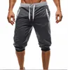 Męskie szorty szorty Mężczyźni Bermuda szorty Mężczyźni Letnia wolna długość kolan Kolan Kolor Kolor Patchwork Joggers Krótkie spodnie dresowe spodnie 230331