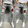 Jeans de jeans Tendência Personalidade Casual Laca de laca angustiada Múltiplos buracos pequenos calças jeans de jeans Hommes Lápis Lápis Menina