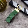 Hombres Mujeres Keychains Lanyards Diseñador Flower Cuero Bag Bag Key Lanyard Classic Keychain Fashion Colgante