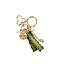 Gros cuir porte-clés porte-clés designer porte-clés couple voiture à la main hommes et femmes sac pendentif accessoires G01