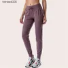 LL femmes Yoga neuvième pantalon pousser Fitness Leggings doux taille haute hanche ascenseur élastique décontracté Jogging 7 couleurs 2023