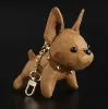 Integritet nyckelringar mode nyckel spänne handväska hängande väskor hund design dollkedjor nyckelknappen nyckelring 4 färg toppkvalitet mycket bra