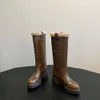 Miui Famille de chaussures pour femmes de meilleure qualité Bottes hautes épaisses 2024 Nouveau talon épais Tête ronde Longueur du genou chaud Bottes longues épaisses