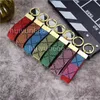 Hombres Mujeres Keychains Lanyards Diseñador Flower Cuero Bag Bag Key Lanyard Classic Keychain Fashion Colgante