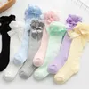 Strumpor barn flickor kunglig stil båge knä hög fisknät baby småbarn bowknot i rörstrumpor. Kid ihålig ut Sock Sox 0-4y