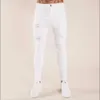 Męskie dżinsy nowe męskie spodnie 2021 Autumn White Hole Black Slim High Talle Dżinsy męskie