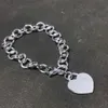 10 years factory wholesale stainless steel heart-shaped short necklace bracelet couples gifts with dust bags.